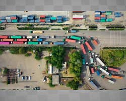 Bird's eye view of trucks navigating harbor traffic, by __Tom Fisk__. This low resolution example video uses the h264 codec